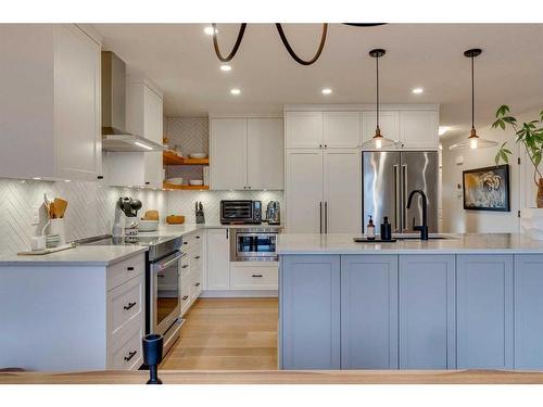 74 Silverado Range Heights Sw, Calgary, AB - Indoor Photo Showing Kitchen With Upgraded Kitchen