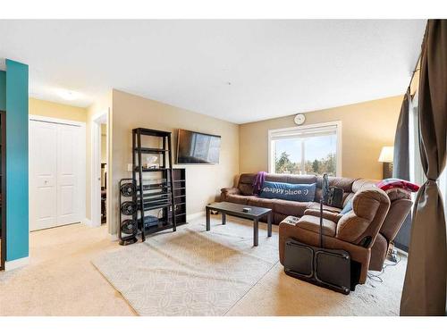 3211-625 Glenbow Drive, Cochrane, AB - Indoor Photo Showing Living Room