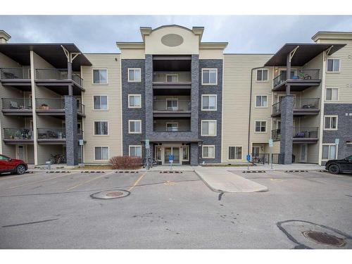 3211-625 Glenbow Drive, Cochrane, AB - Outdoor With Balcony With Facade