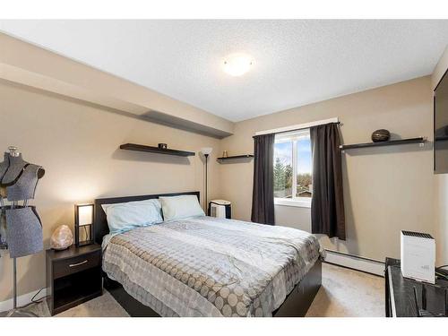 3211-625 Glenbow Drive, Cochrane, AB - Indoor Photo Showing Bedroom