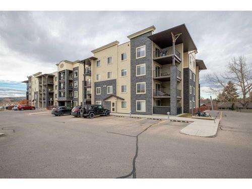 3211-625 Glenbow Drive, Cochrane, AB - Outdoor With Balcony With Facade