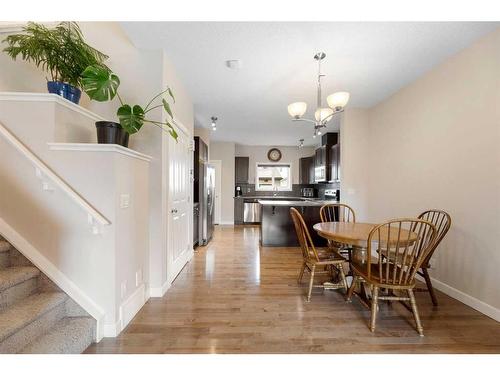 9 Belgian Street, Cochrane, AB - Indoor Photo Showing Dining Room