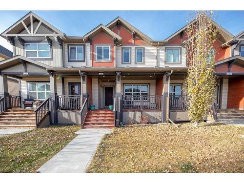 9 Belgian Street, Cochrane, AB - Outdoor With Deck Patio Veranda With Facade