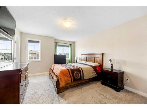 9 Belgian Street, Cochrane, AB - Indoor Photo Showing Bedroom