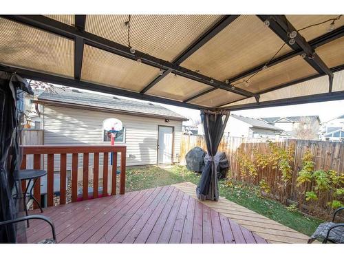 9 Belgian Street, Cochrane, AB - Outdoor With Deck Patio Veranda With Exterior