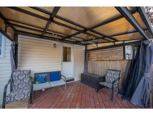 9 Belgian Street, Cochrane, AB - Indoor Photo Showing Garage