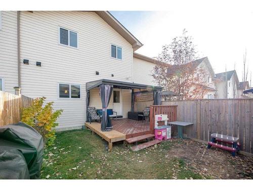 9 Belgian Street, Cochrane, AB - Outdoor With Deck Patio Veranda With Exterior