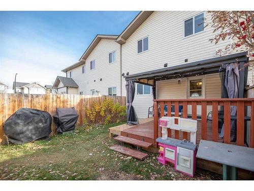 9 Belgian Street, Cochrane, AB - Outdoor With Deck Patio Veranda With Exterior