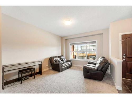 9 Belgian Street, Cochrane, AB - Indoor Photo Showing Other Room