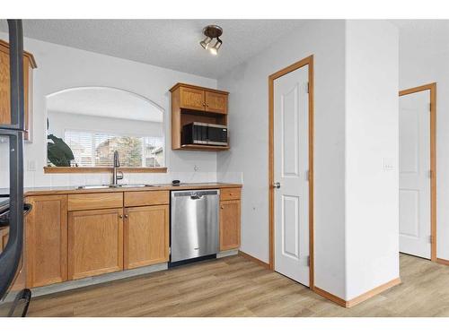 46 Cramond Crescent Se, Calgary, AB - Indoor Photo Showing Kitchen With Stainless Steel Kitchen With Double Sink