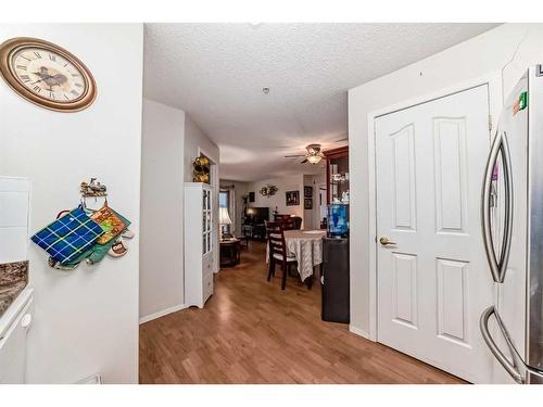 115-5000 Somervale Court Sw, Calgary, AB - Indoor Photo Showing Other Room