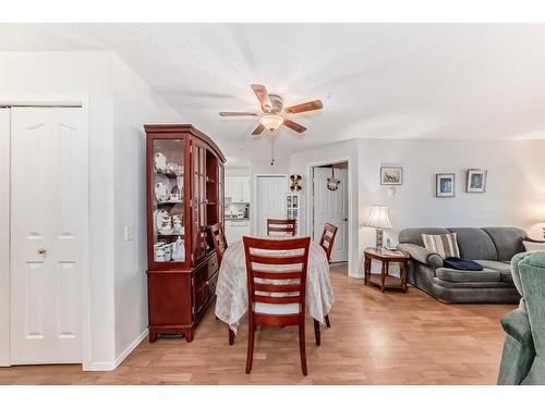 115-5000 Somervale Court Sw, Calgary, AB - Indoor Photo Showing Living Room