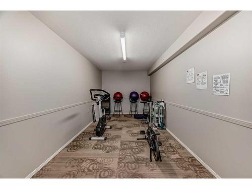 115-5000 Somervale Court Sw, Calgary, AB - Indoor Photo Showing Other Room