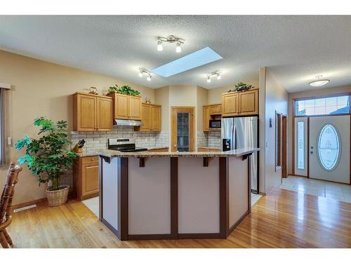 605 Woodside Court Nw, Airdrie, AB - Indoor Photo Showing Kitchen