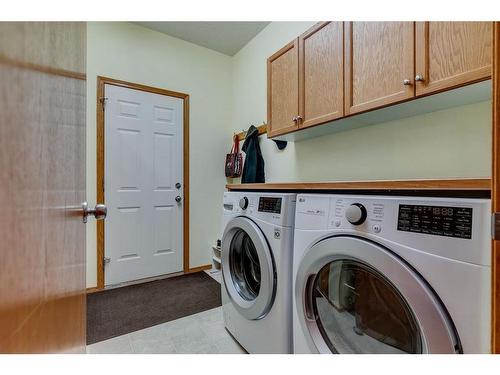 605 Woodside Court Nw, Airdrie, AB - Indoor Photo Showing Laundry Room