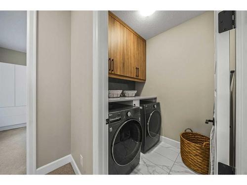 40 Carrington Close Nw, Calgary, AB - Indoor Photo Showing Laundry Room