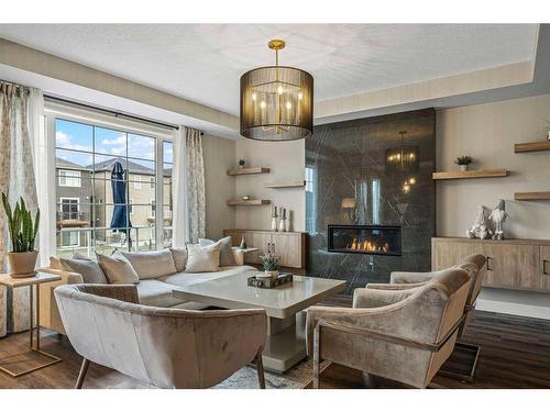 40 Carrington Close Nw, Calgary, AB - Indoor Photo Showing Living Room With Fireplace