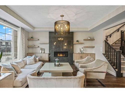 40 Carrington Close Nw, Calgary, AB - Indoor Photo Showing Living Room With Fireplace