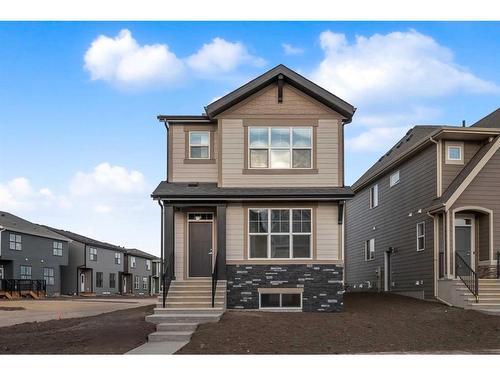 118 Magnolia Drive Se, Calgary, AB - Outdoor With Facade