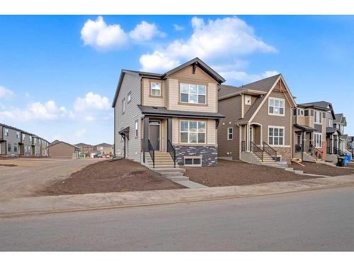 118 Magnolia Drive Se, Calgary, AB - Outdoor With Facade