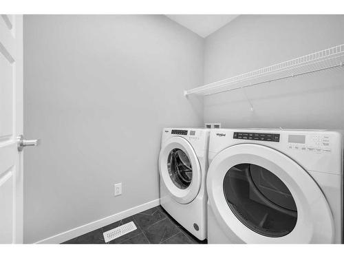 118 Magnolia Drive Se, Calgary, AB - Indoor Photo Showing Laundry Room