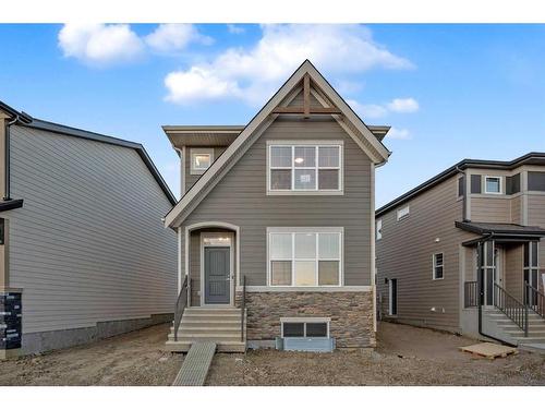 122 Magnolia Drive, Calgary, AB - Outdoor With Facade