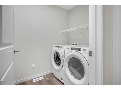 122 Magnolia Drive, Calgary, AB - Indoor Photo Showing Laundry Room