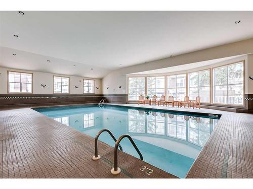 307-3650 Marda Link Sw, Calgary, AB - Indoor Photo Showing Other Room With In Ground Pool