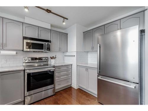 307-3650 Marda Link Sw, Calgary, AB - Indoor Photo Showing Kitchen