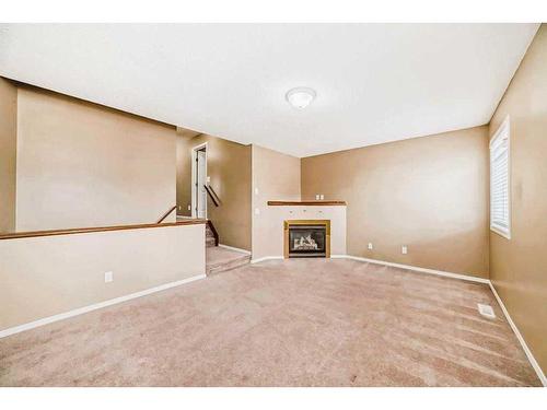 69 Saddlehorn Crescent Ne, Calgary, AB - Indoor With Fireplace