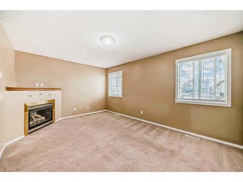 69 Saddlehorn Crescent Ne, Calgary, AB - Indoor With Fireplace