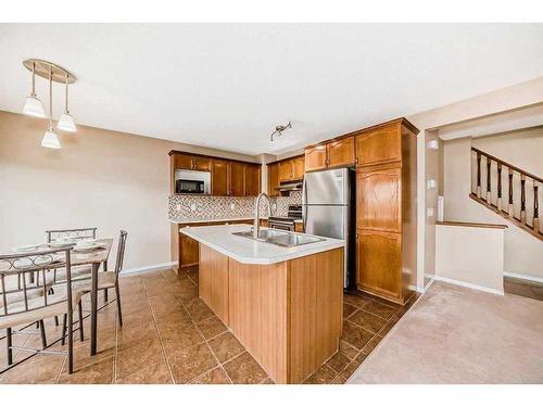 69 Saddlehorn Crescent Ne, Calgary, AB - Indoor Photo Showing Kitchen With Double Sink