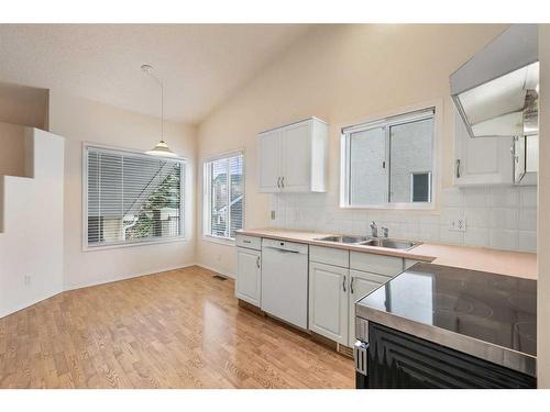 309 Sierra Morena Green Sw, Calgary, AB - Indoor Photo Showing Kitchen With Double Sink