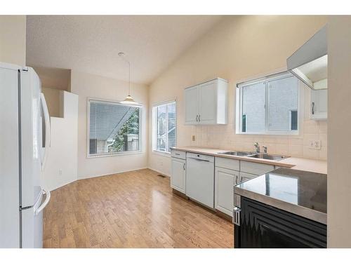 309 Sierra Morena Green Sw, Calgary, AB - Indoor Photo Showing Kitchen With Double Sink