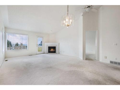 309 Sierra Morena Green Sw, Calgary, AB - Indoor With Fireplace