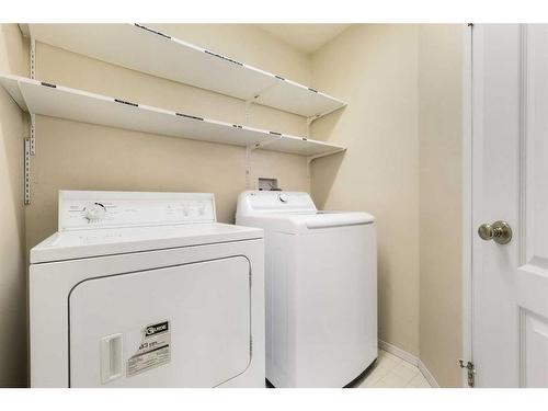 309 Sierra Morena Green Sw, Calgary, AB - Indoor Photo Showing Laundry Room