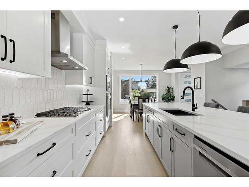 1411 41 Street Sw, Calgary, AB - Indoor Photo Showing Kitchen With Double Sink With Upgraded Kitchen