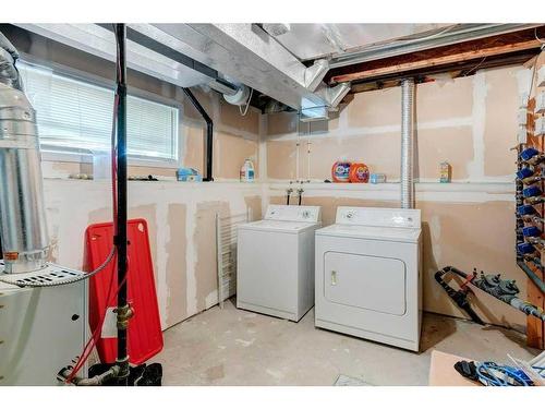 39 Tuscany Springs Gardens Nw, Calgary, AB - Indoor Photo Showing Laundry Room