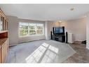 39 Tuscany Springs Gardens Nw, Calgary, AB  - Indoor Photo Showing Living Room 