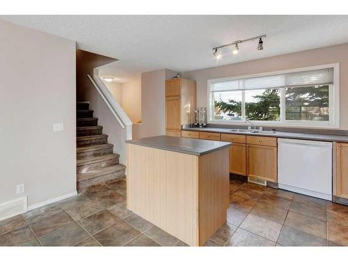 39 Tuscany Springs Gardens Nw, Calgary, AB - Indoor Photo Showing Kitchen With Double Sink