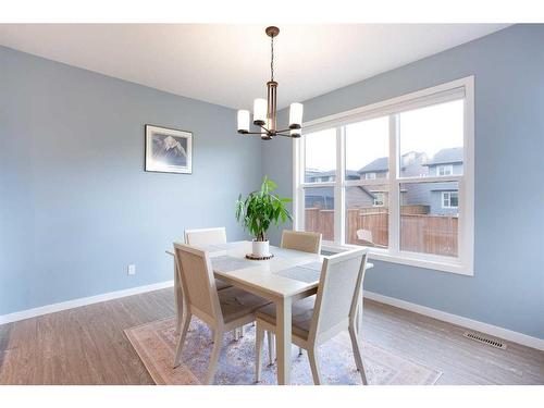 128 Sundown Way, Cochrane, AB - Indoor Photo Showing Dining Room