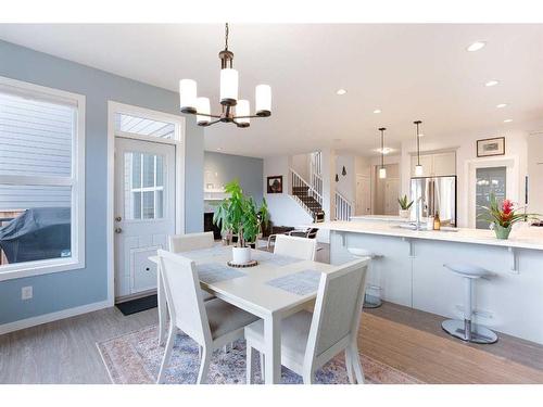 128 Sundown Way, Cochrane, AB - Indoor Photo Showing Dining Room