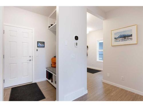 128 Sundown Way, Cochrane, AB - Indoor Photo Showing Other Room