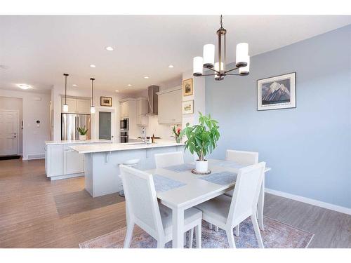 128 Sundown Way, Cochrane, AB - Indoor Photo Showing Dining Room