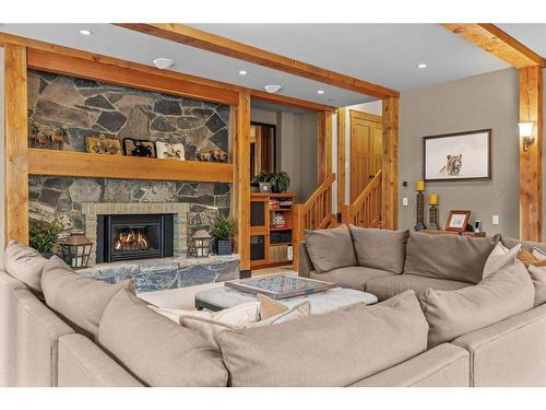 102 Cairns Landing, Canmore, AB - Indoor Photo Showing Living Room With Fireplace