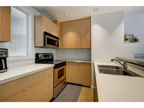 915 18 Avenue Sw, Calgary, AB - Indoor Photo Showing Kitchen With Double Sink