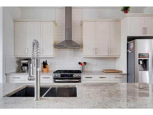 914 Remington Road Ne, Calgary, AB - Indoor Photo Showing Kitchen With Double Sink With Upgraded Kitchen