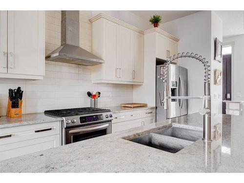 914 Remington Road Ne, Calgary, AB - Indoor Photo Showing Kitchen With Stainless Steel Kitchen With Double Sink With Upgraded Kitchen