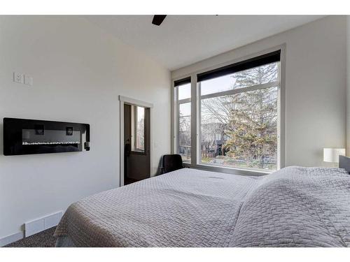 914 Remington Road Ne, Calgary, AB - Indoor Photo Showing Bedroom