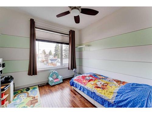 914 Remington Road Ne, Calgary, AB - Indoor Photo Showing Bedroom